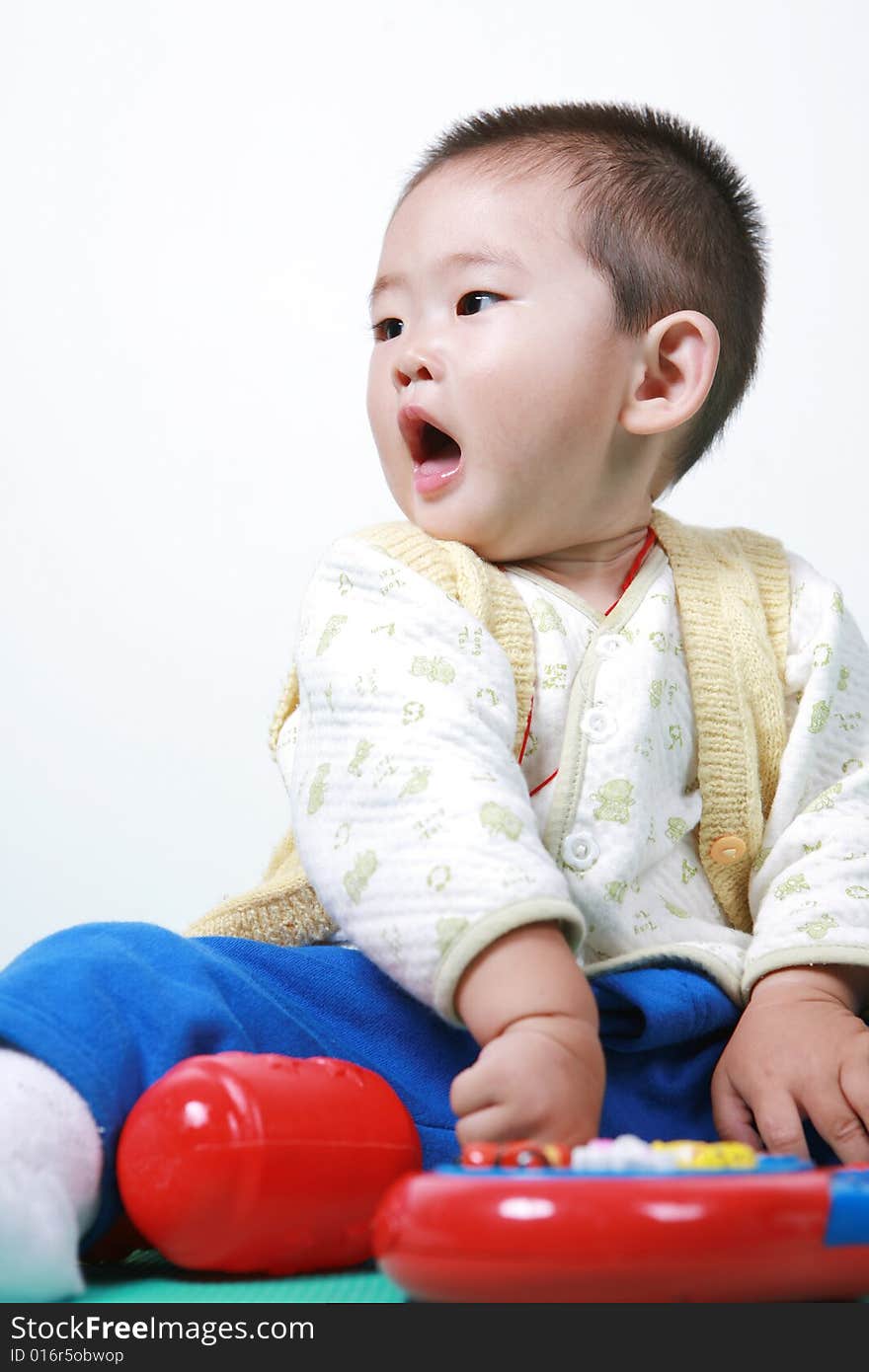 Young chinese boy play with toy. Young chinese boy play with toy