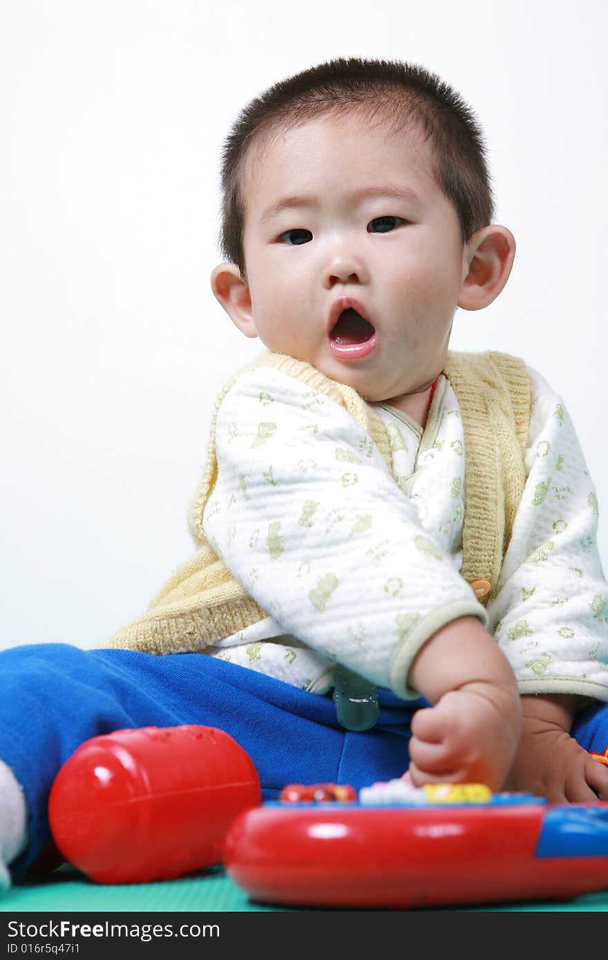 Young chinese boy play with toy. Young chinese boy play with toy