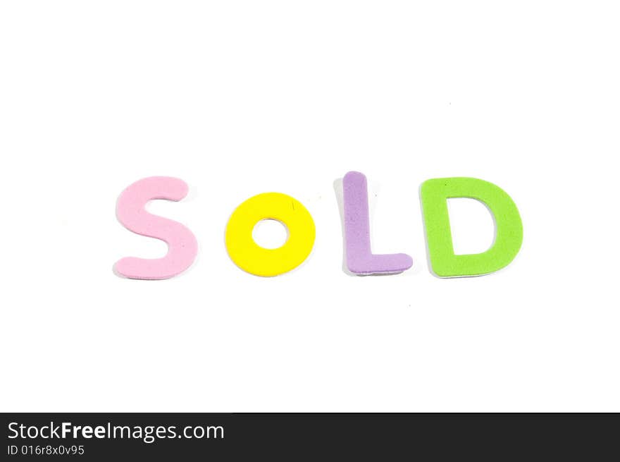 Sold in colorfull letters isolated on white