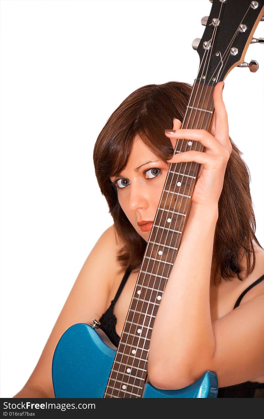 Young beautiful woman with guitar