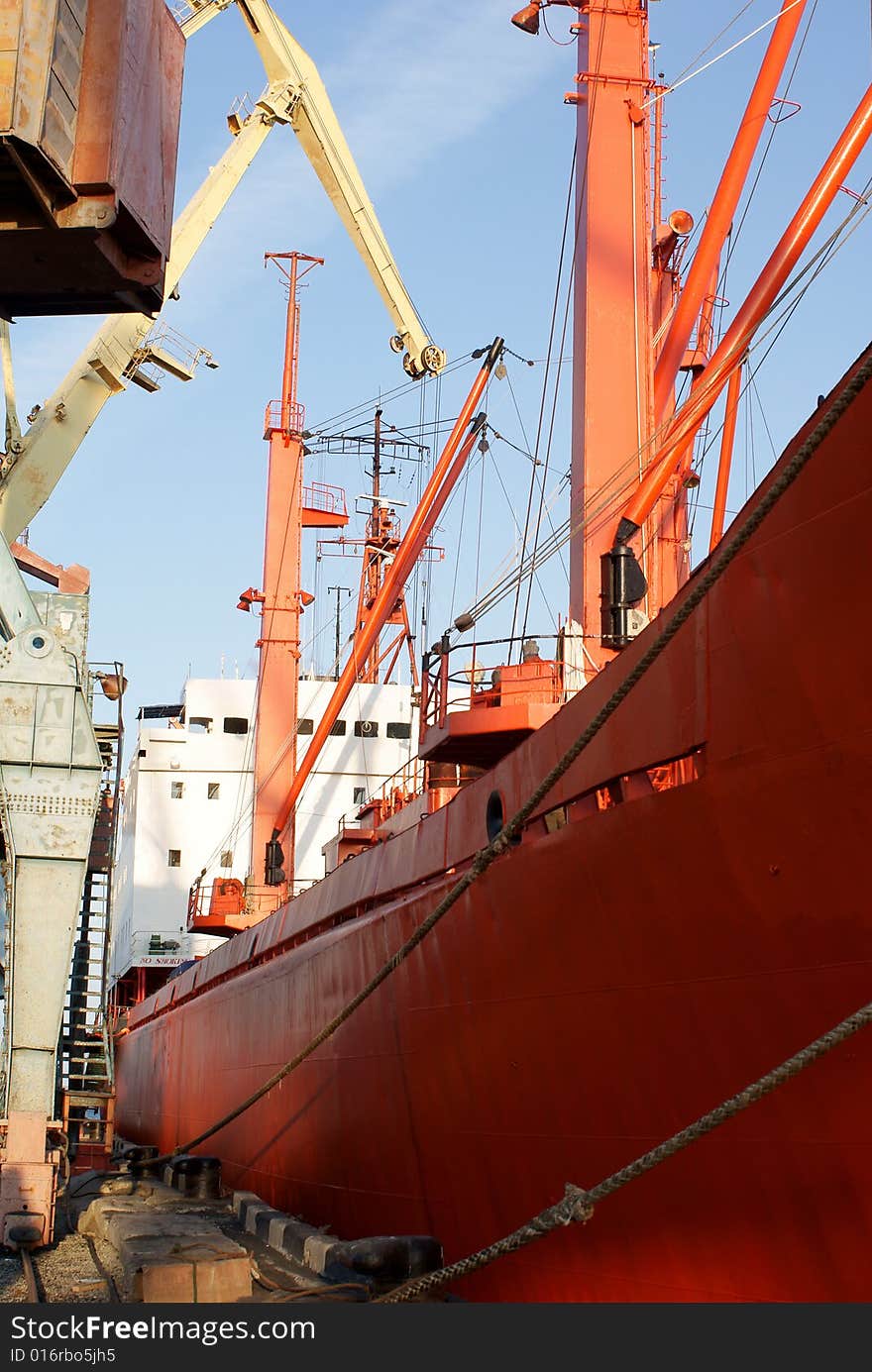 The freight ship in the port. The freight ship in the port