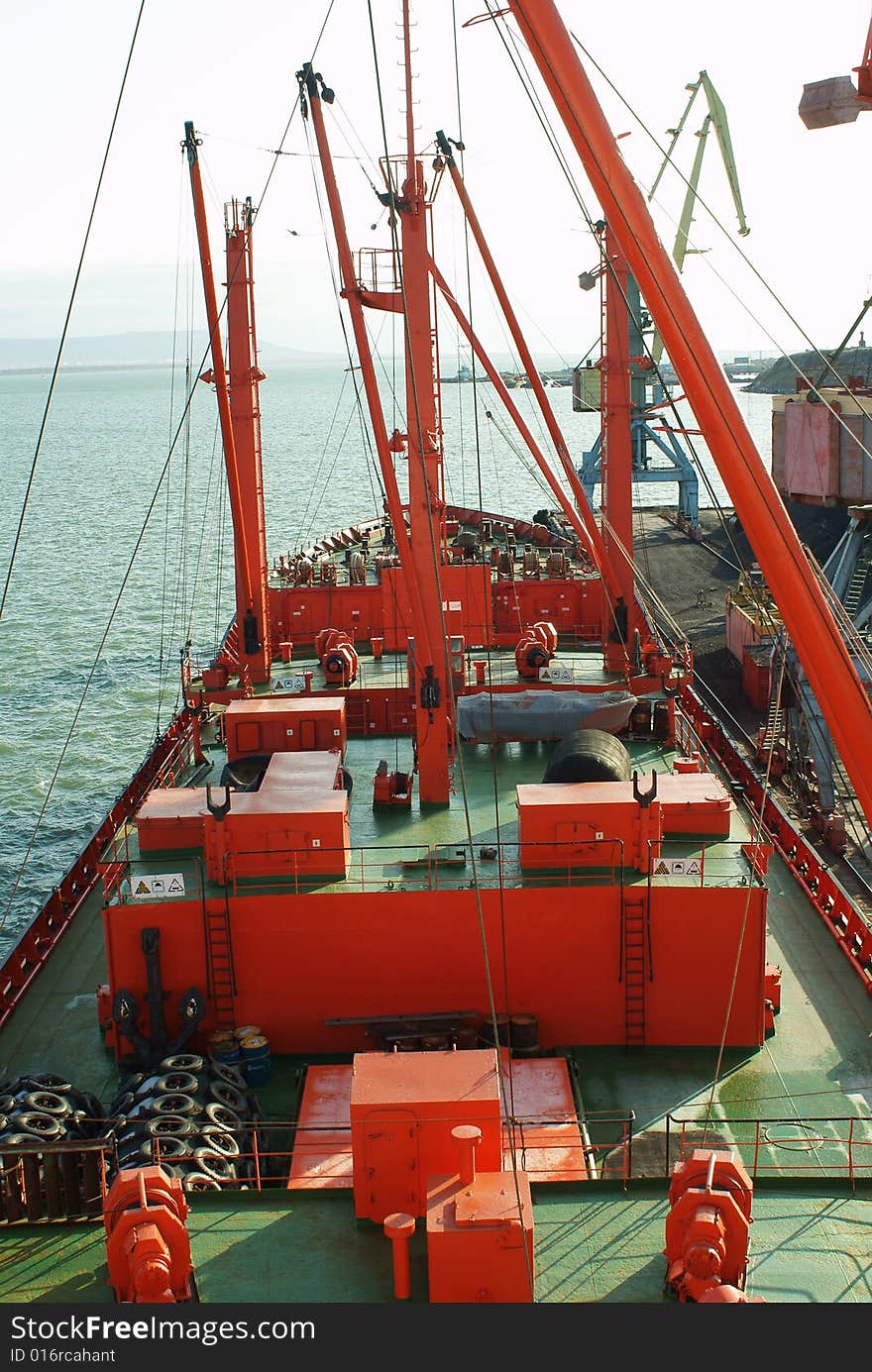 The freight ship in the port. The freight ship in the port