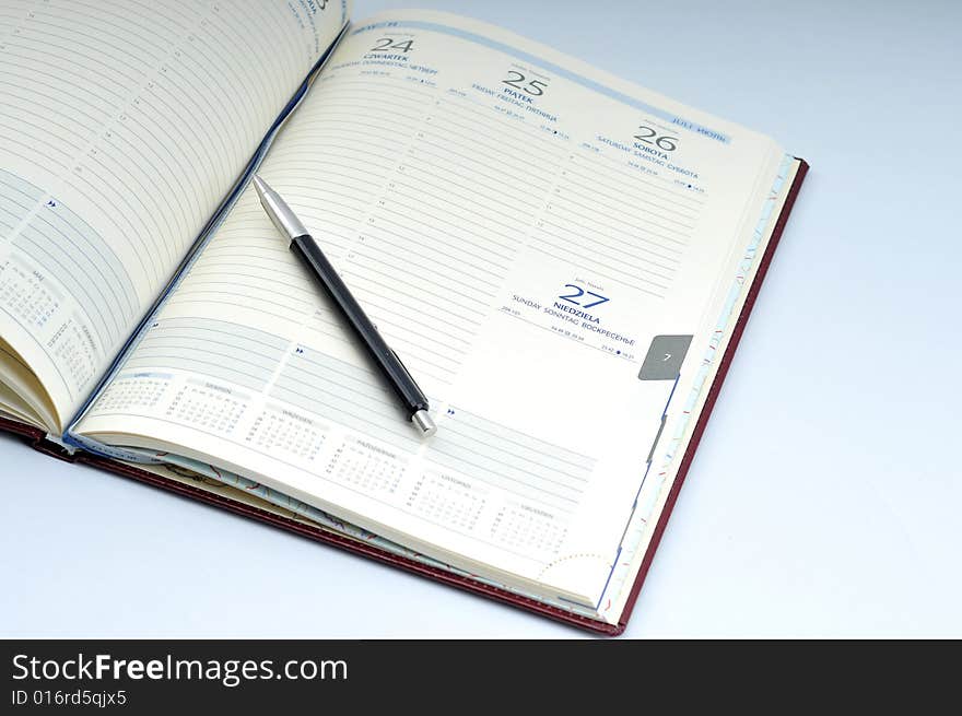 Image of opened agenda, planner. Image of opened agenda, planner