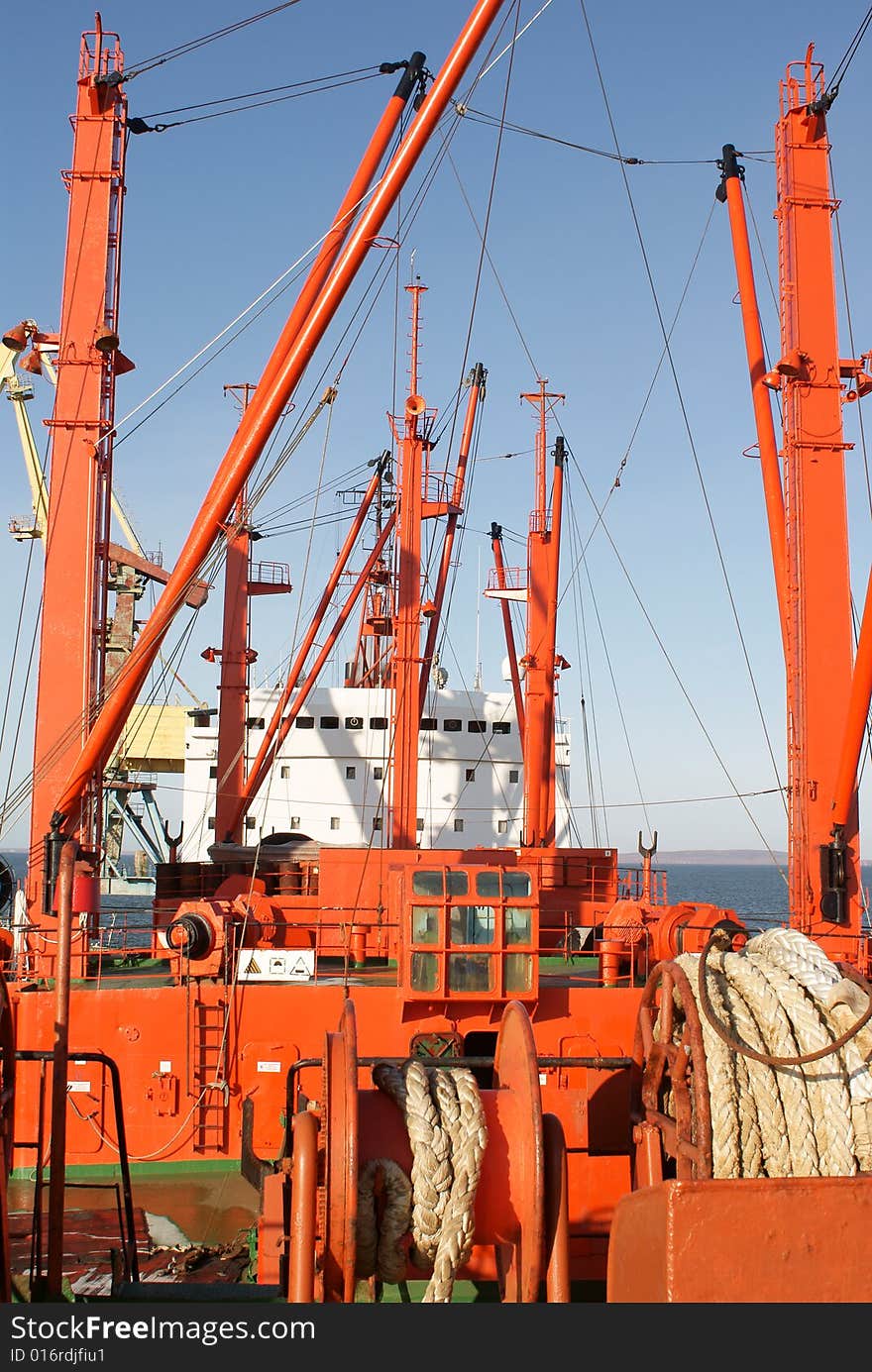 The freight ship in the port. The freight ship in the port