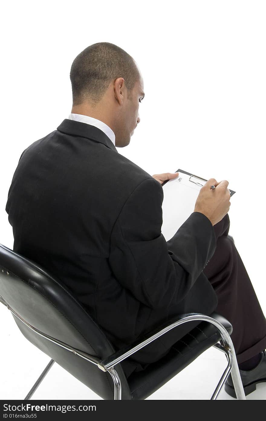 Businessman posing from behind with white background