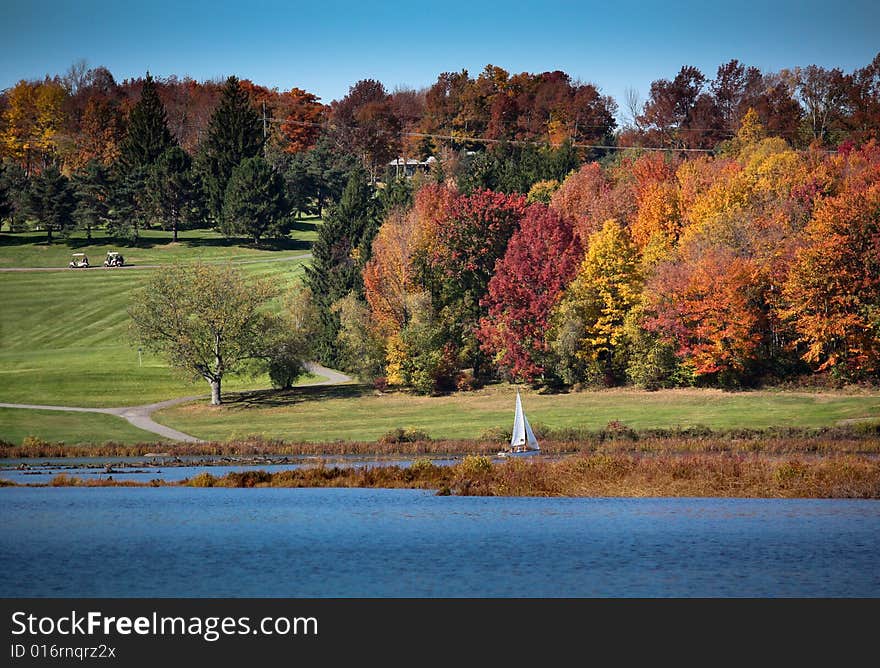 Golfcourse near a lake on a sunny October afternoon. Golfcourse near a lake on a sunny October afternoon