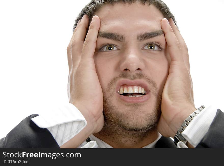 Frustrated young businessman on an isolated background