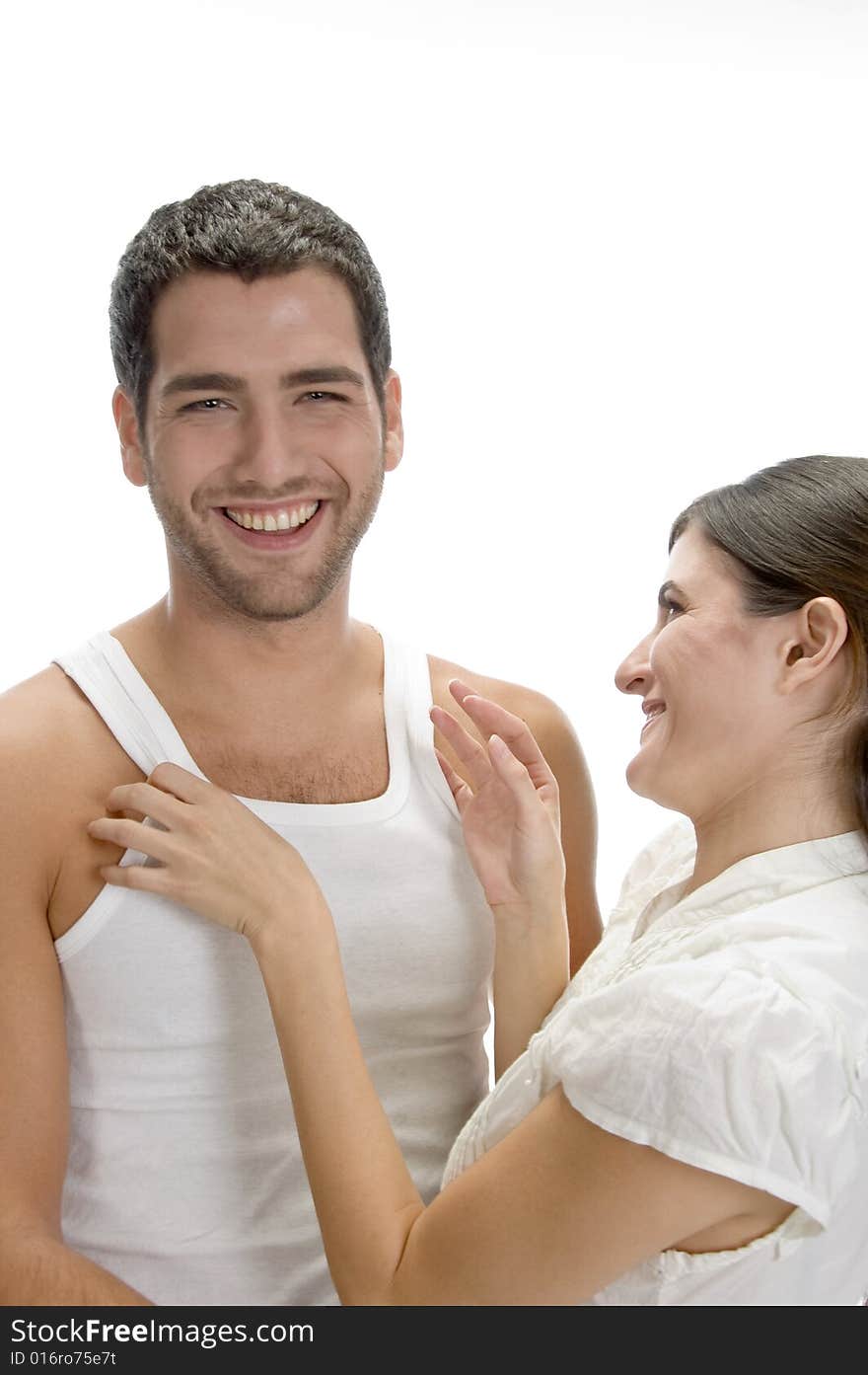 Laughing romantic couple against white background