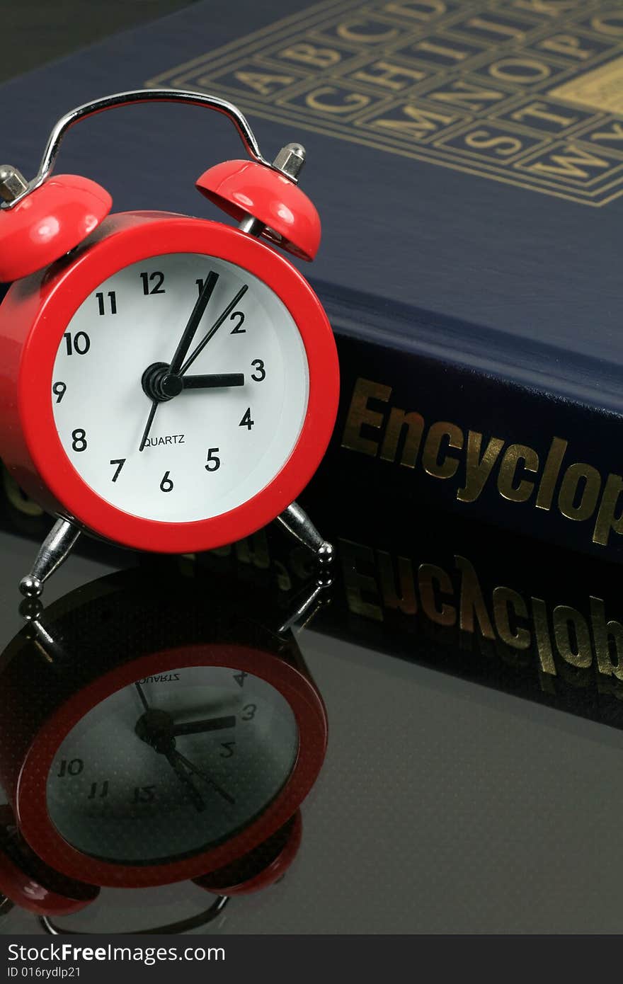 Alarm Clock with Encyclopedia on Glass