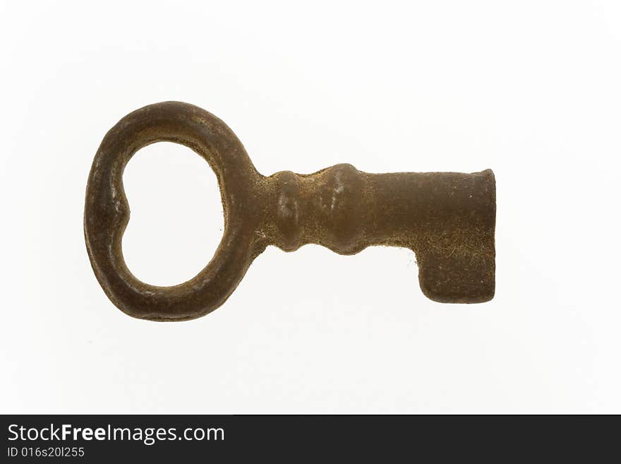 Old rusted key isolated on white background. Old rusted key isolated on white background