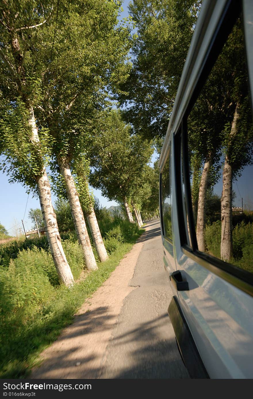 Back view of jeep when driving on the country road