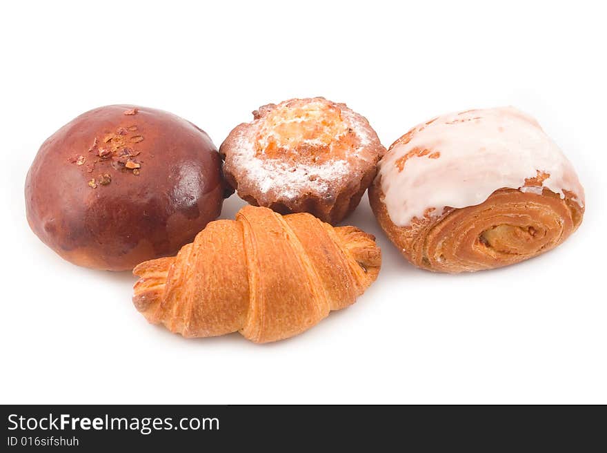 Tasty beautiful rolls from puff and barmy test wheat flour for white background