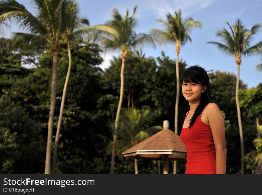 Smiling woman and palm trees. Smiling woman and palm trees.