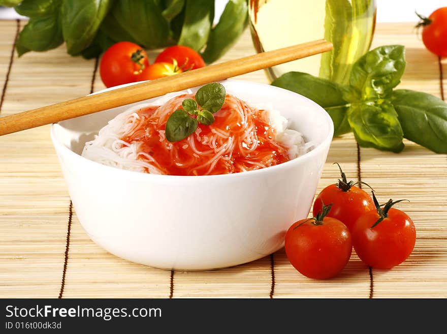 Tasty rice pasta with tomatoes