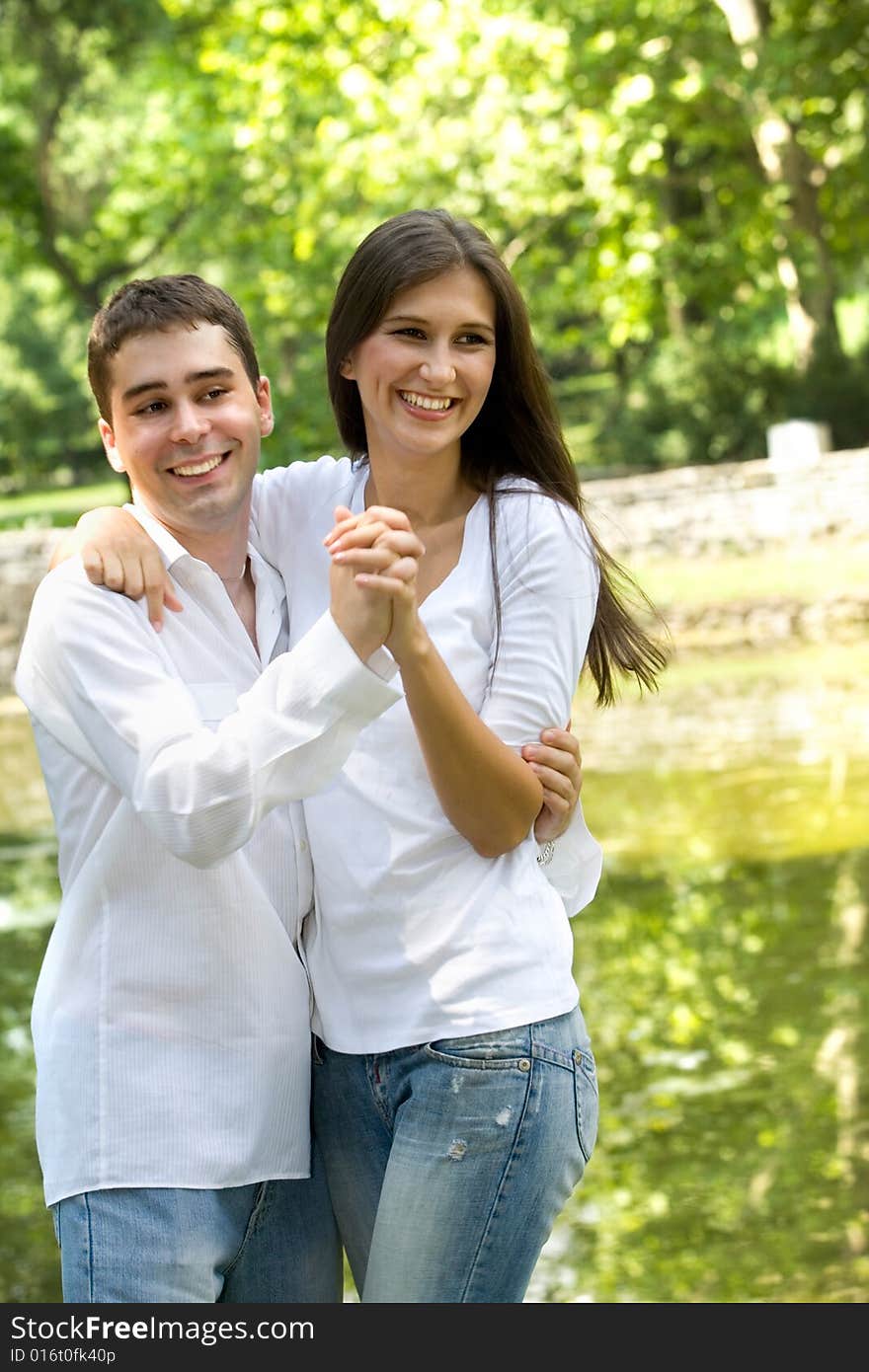 Couple in love having fun at the park