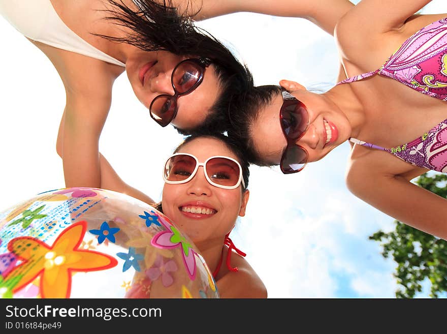 Group of asian girls having fun under the bright blue sky. Group of asian girls having fun under the bright blue sky