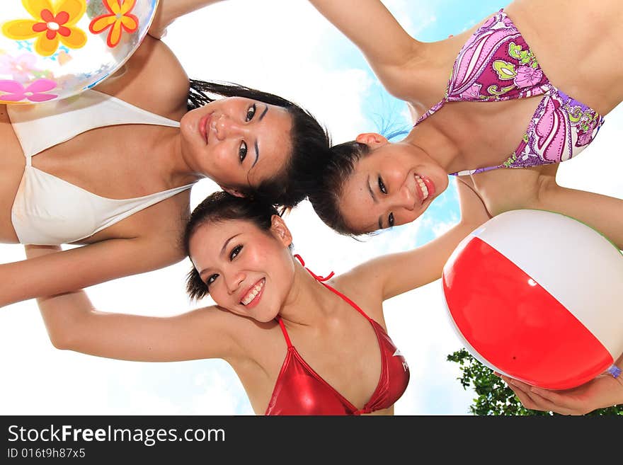 Group of asian girls having fun under the bright blue sky. Group of asian girls having fun under the bright blue sky