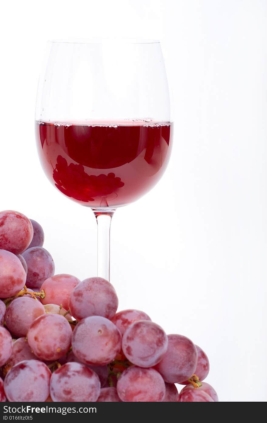 Red wine with glass. White background.