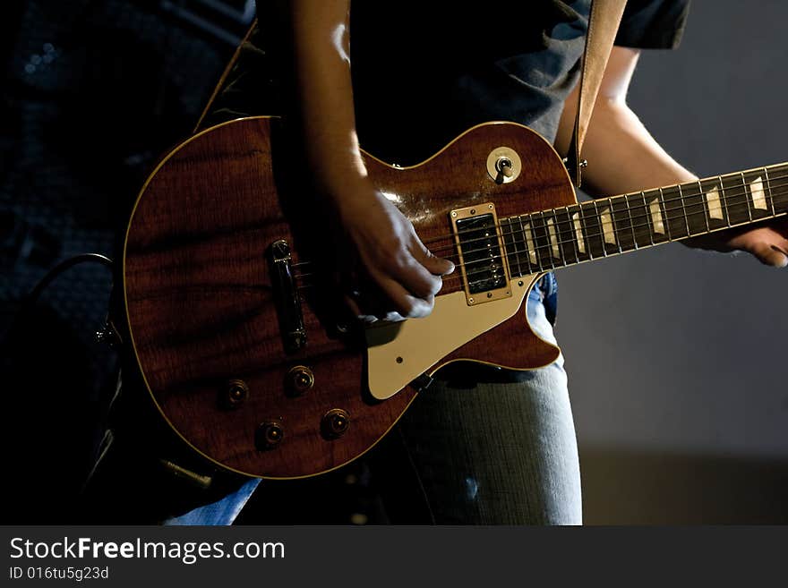 Guitarist of a rock band with a guitar