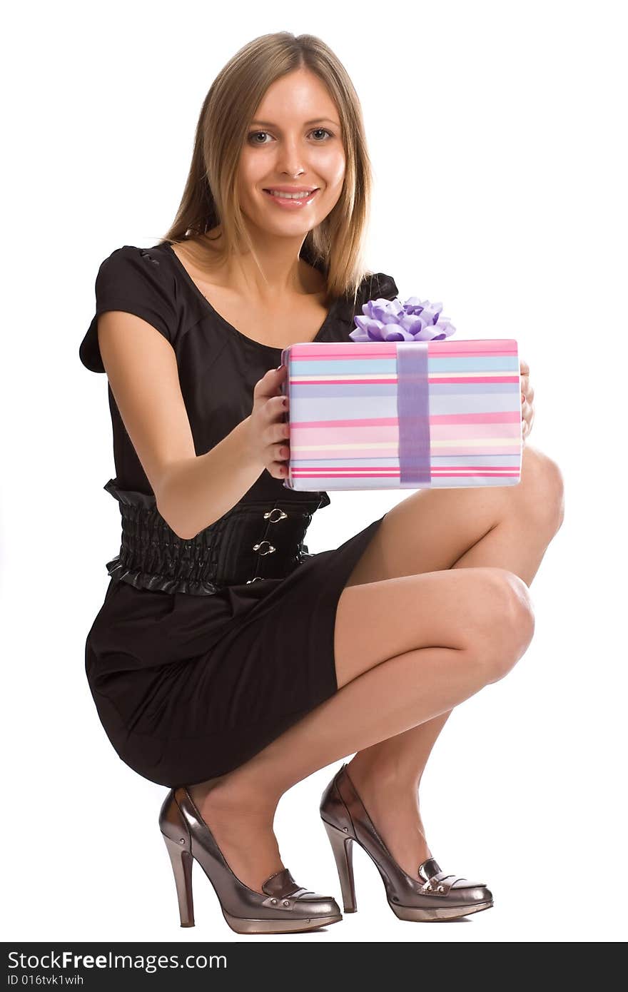 Girl with gift box on white background. Girl with gift box on white background