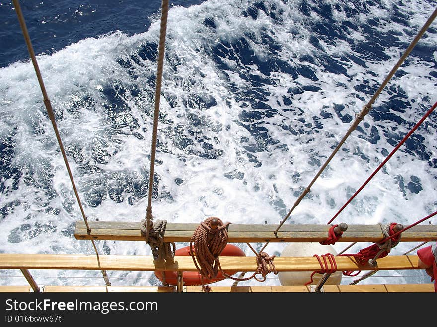 View from top of a boat to the water. View from top of a boat to the water