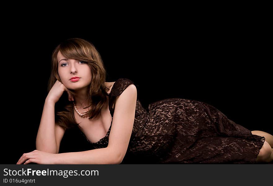 Young woman on black