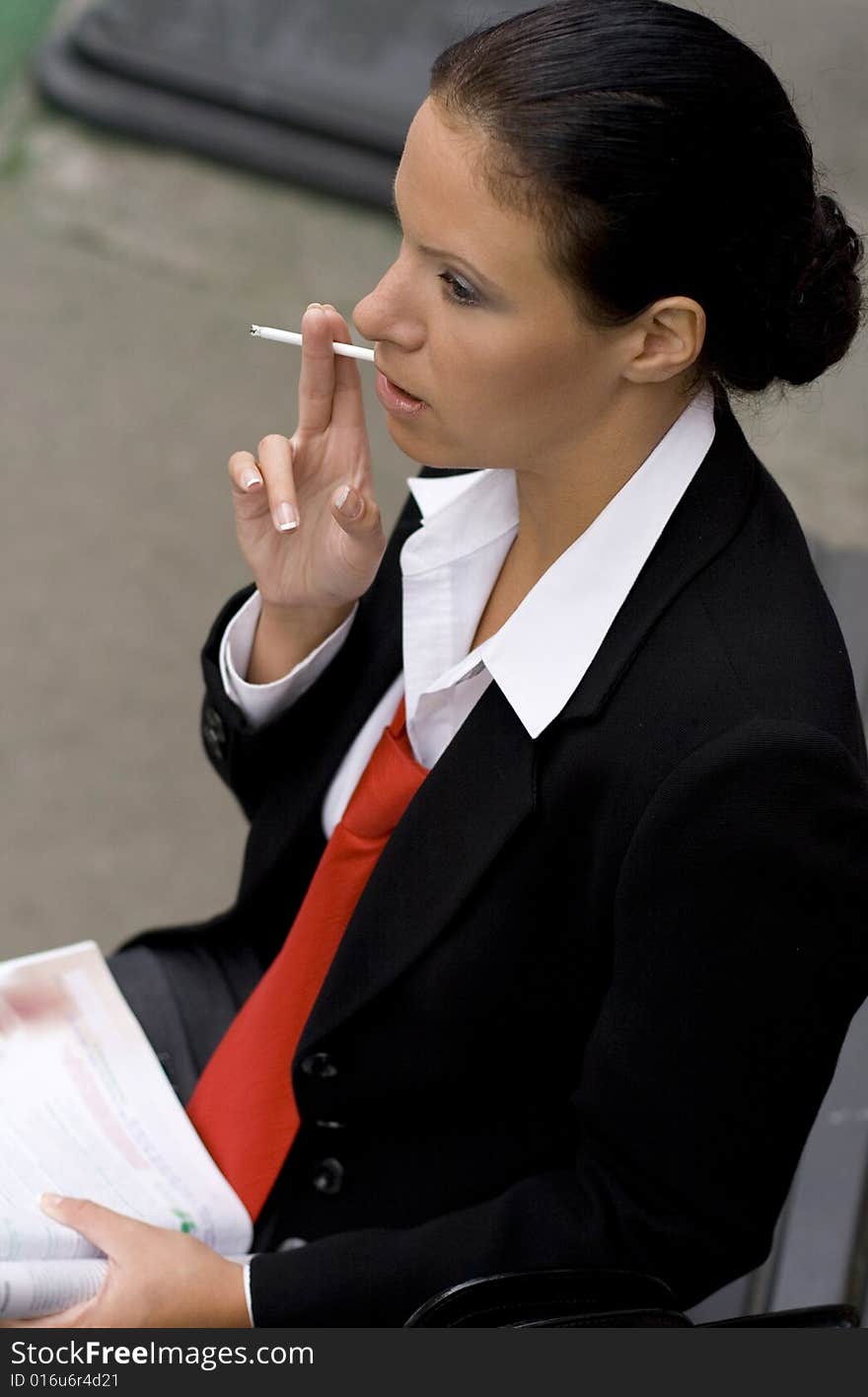 Businesswoman With Cigarette