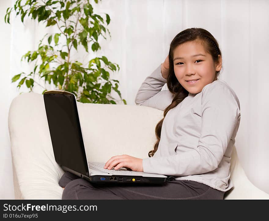 Teenager girl with notebook indoors