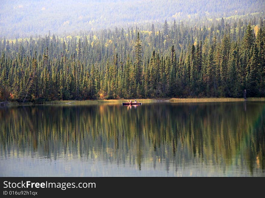 A canoes on a lake in Jasper National Park. A canoes on a lake in Jasper National Park