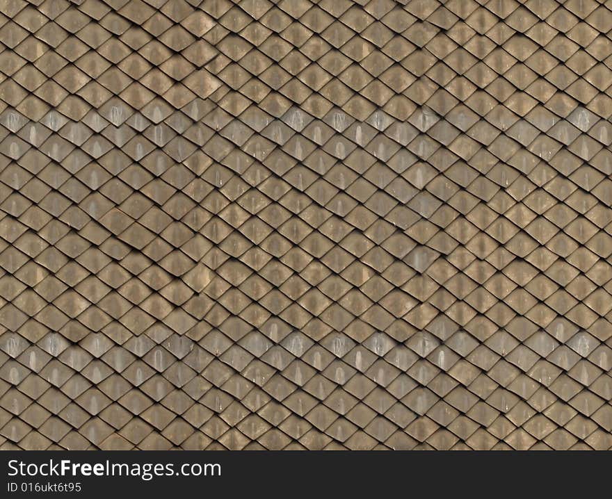 Ancient roof, brown and grey, texture suitable for iterations, skins of buildings. Ancient roof, brown and grey, texture suitable for iterations, skins of buildings