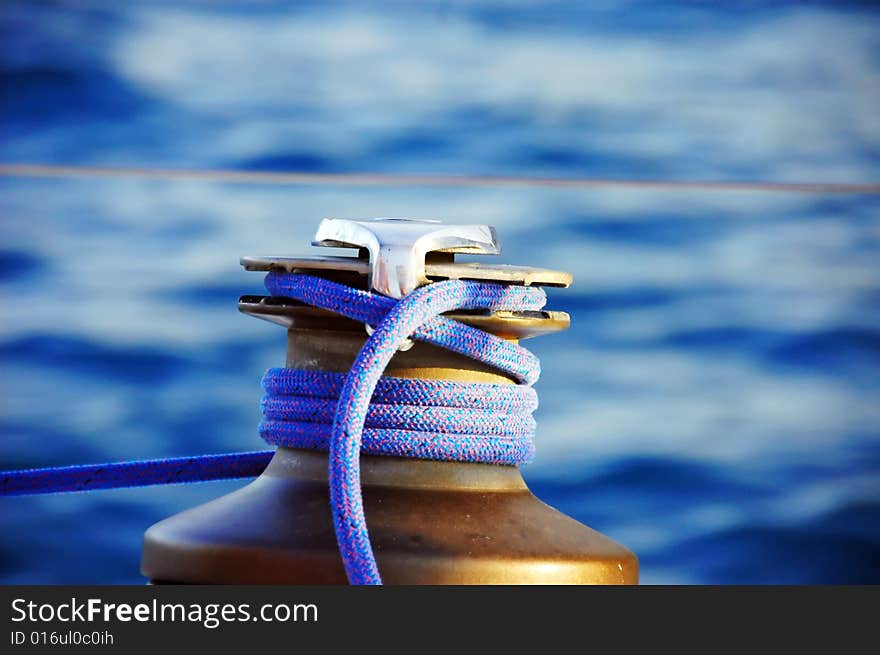 Shot of a winch and ropes on a yacht