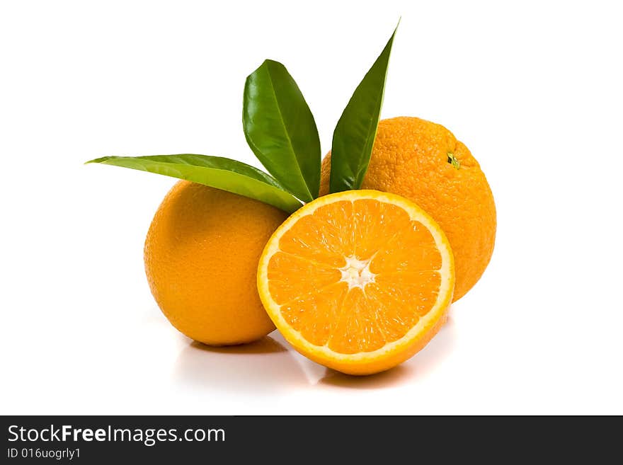 Ripe oranges isolated on white