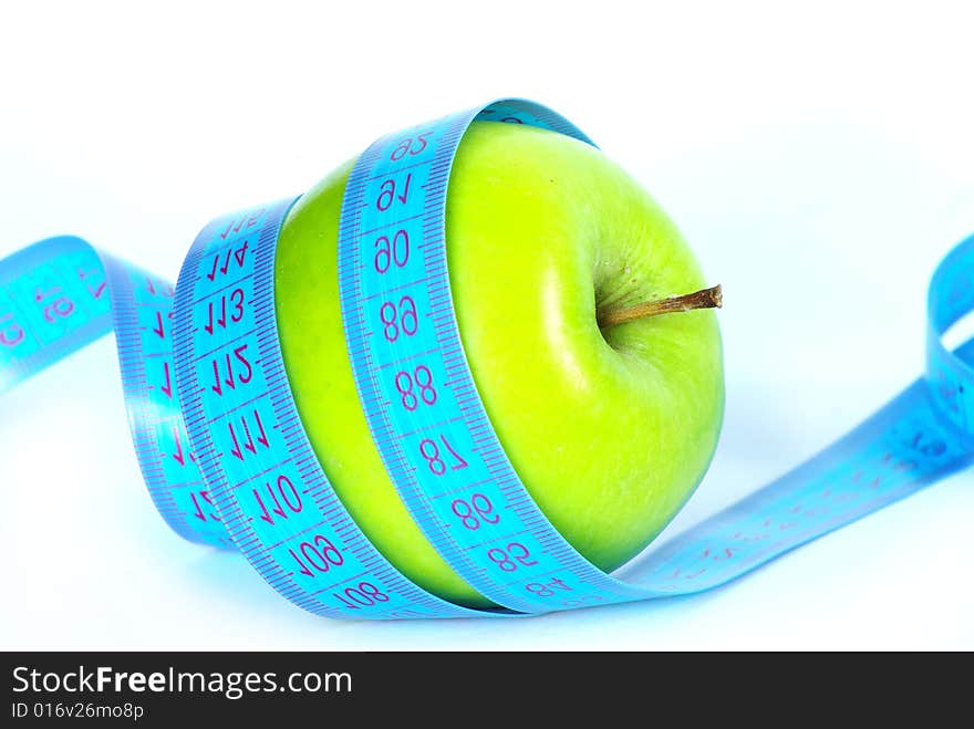 Apple and measuring tape