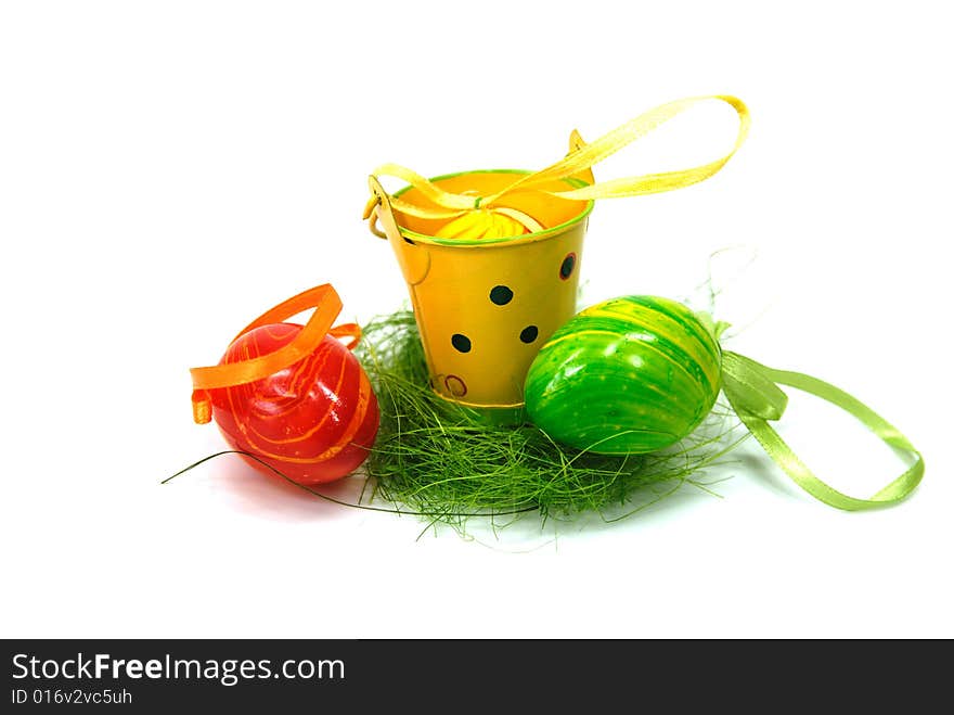 Green, yellow and red eggs for eastern and a cup. Green, yellow and red eggs for eastern and a cup