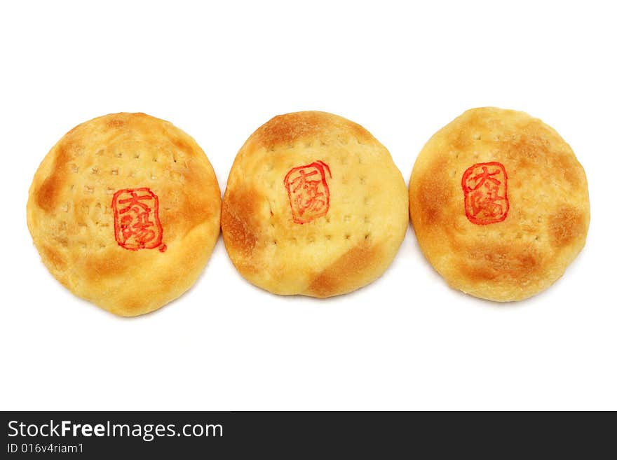 Three pieces of Chinese cream pastry isolated on white background.