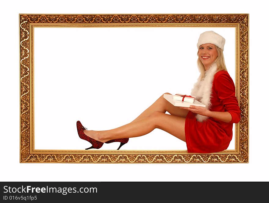 Woman sitting in frame with christmas presents in her arms. Woman sitting in frame with christmas presents in her arms