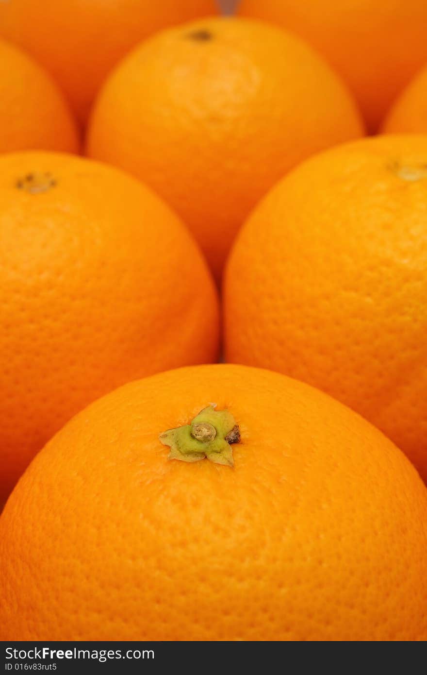 Close up of many oranges as fruit background.