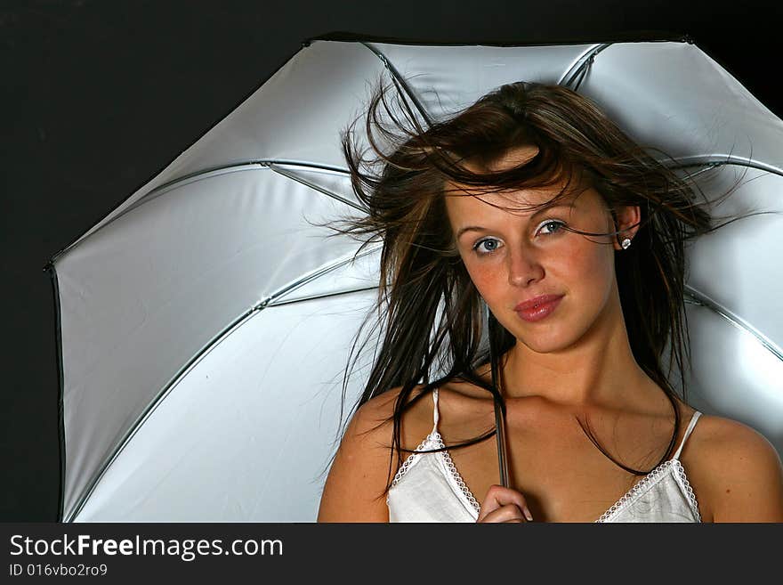 Beautiful girl with white umbrella