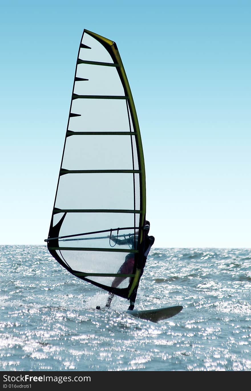 Windsurfer on waves