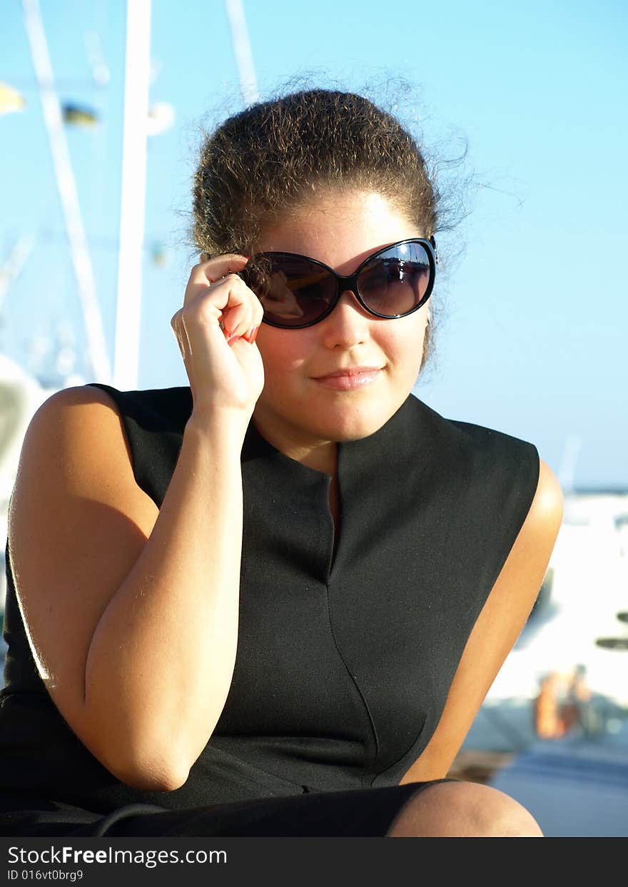 Young woman in sunglasses