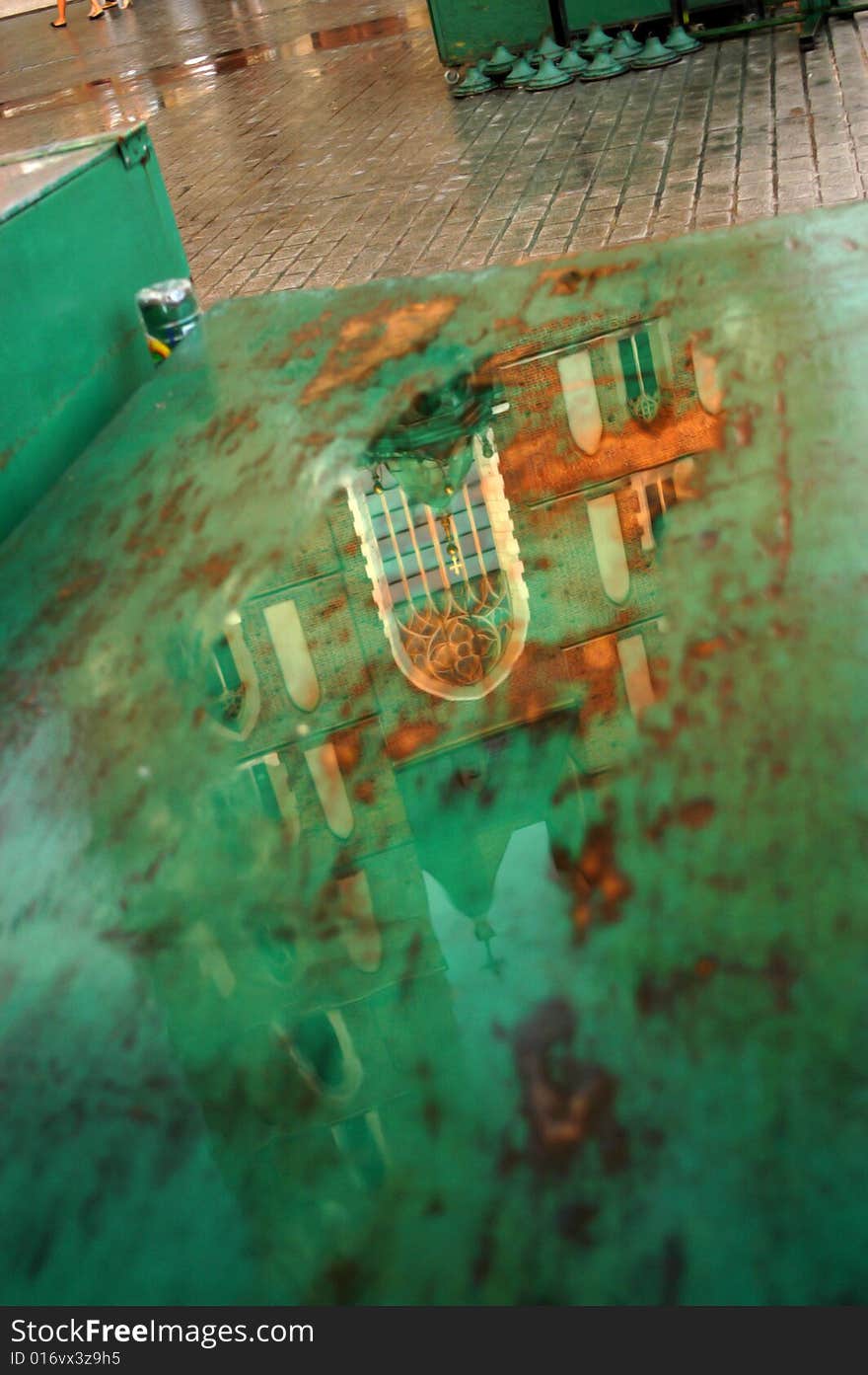 Mariacki church reflected in a puddle.