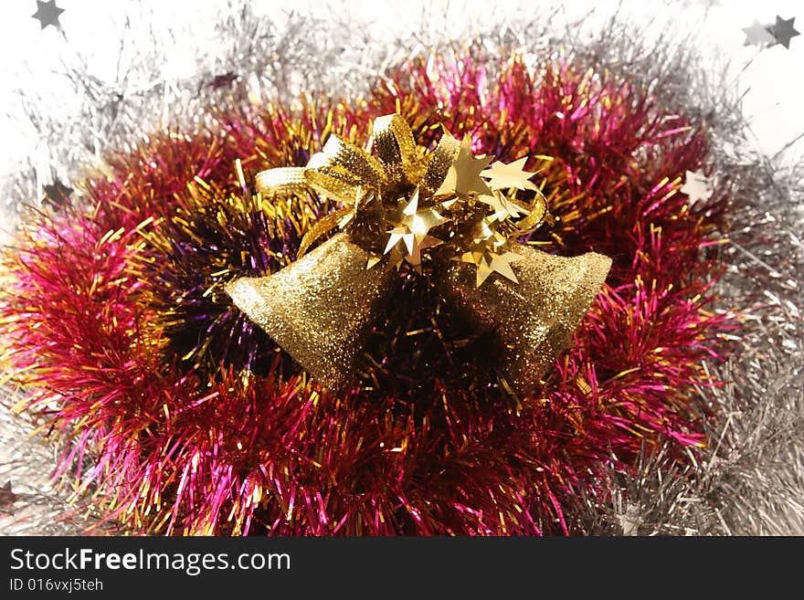 Christmas hand bells in a celebratory tinsel. Christmas hand bells in a celebratory tinsel