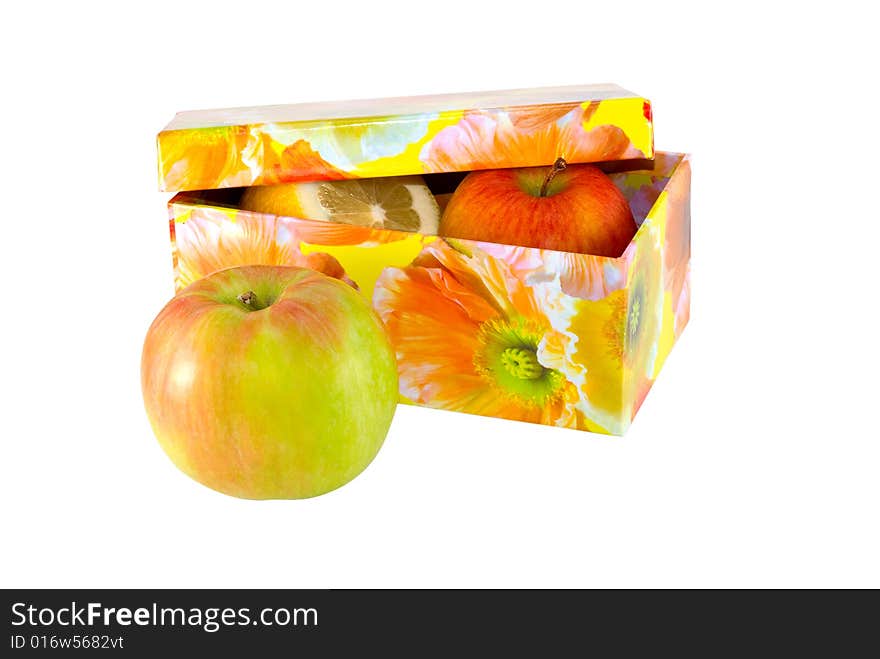 Limon and apples in a box on a white background. Limon and apples in a box on a white background