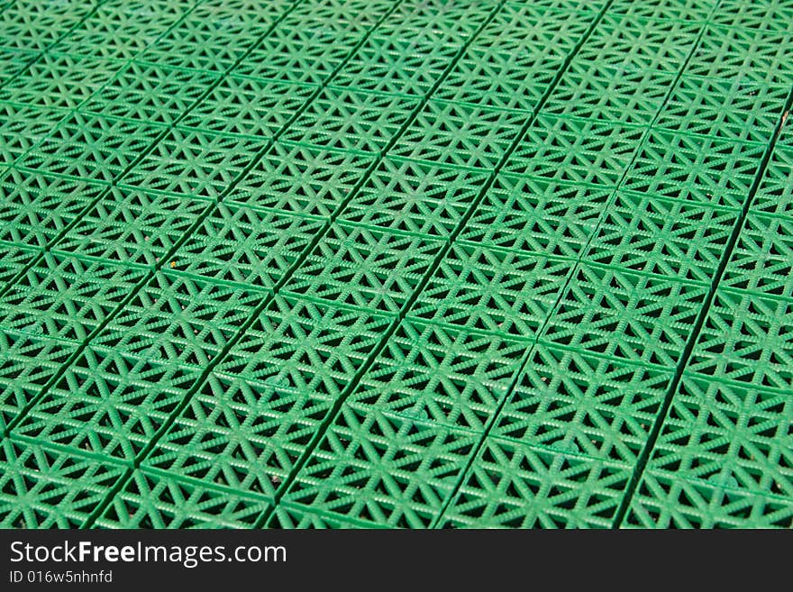 Artificial tennis court cover, green, close-up