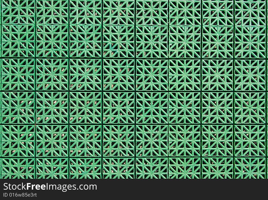 Artificial tennis court cover, green, close-up