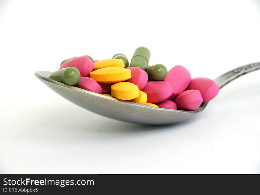 Colourful pills instead of healthy meal. Colourful pills instead of healthy meal