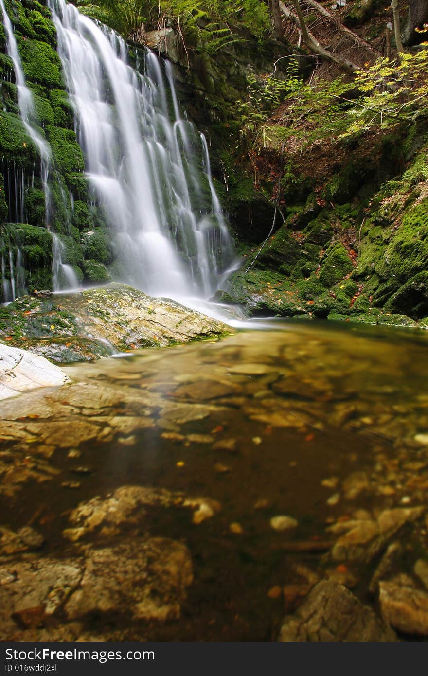 Waterfall on the mountain stream