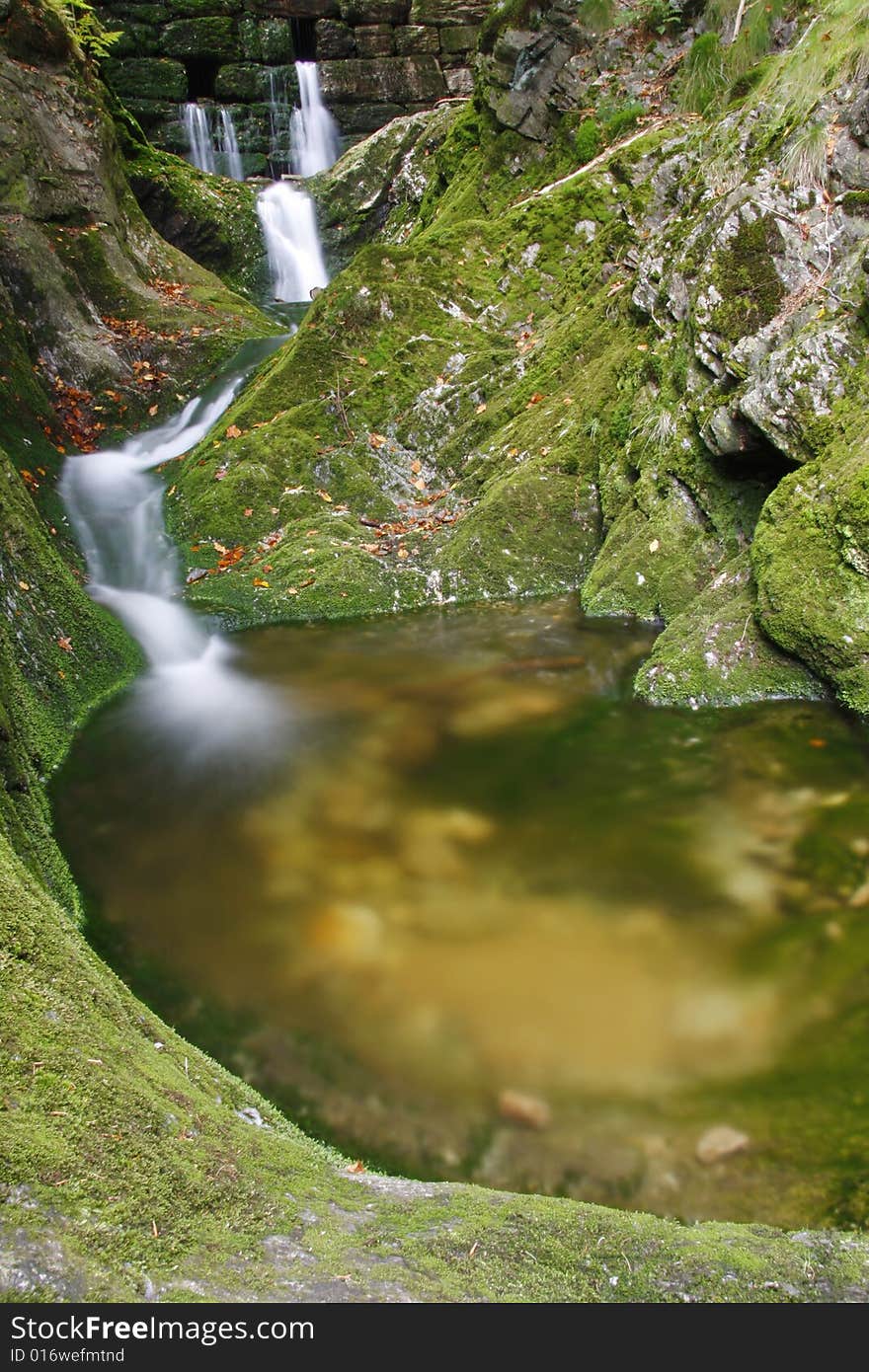 Waterfall On Mountain Stream