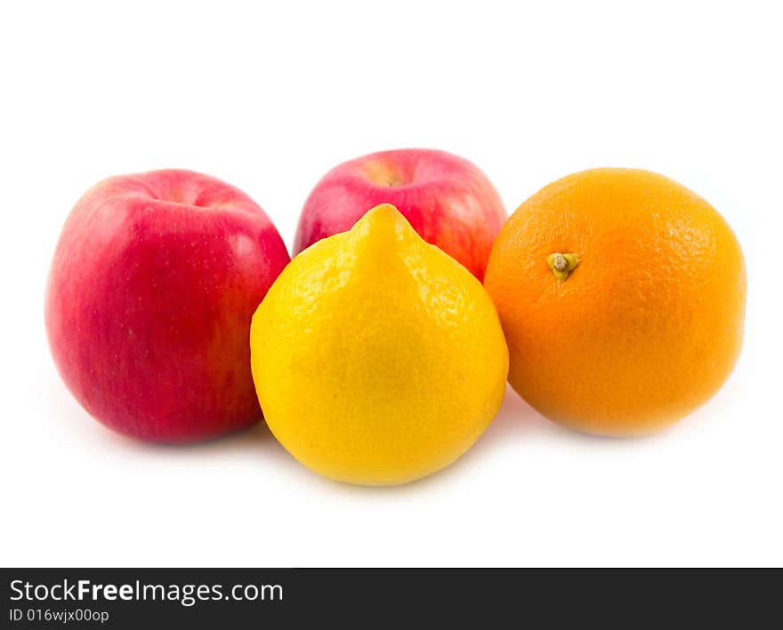 Beautiful sour lemon with orange and red tasty useful apples on white background