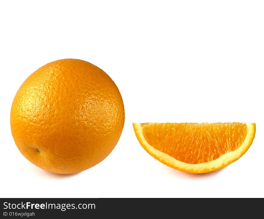 Orange fruit with cut segment isolated